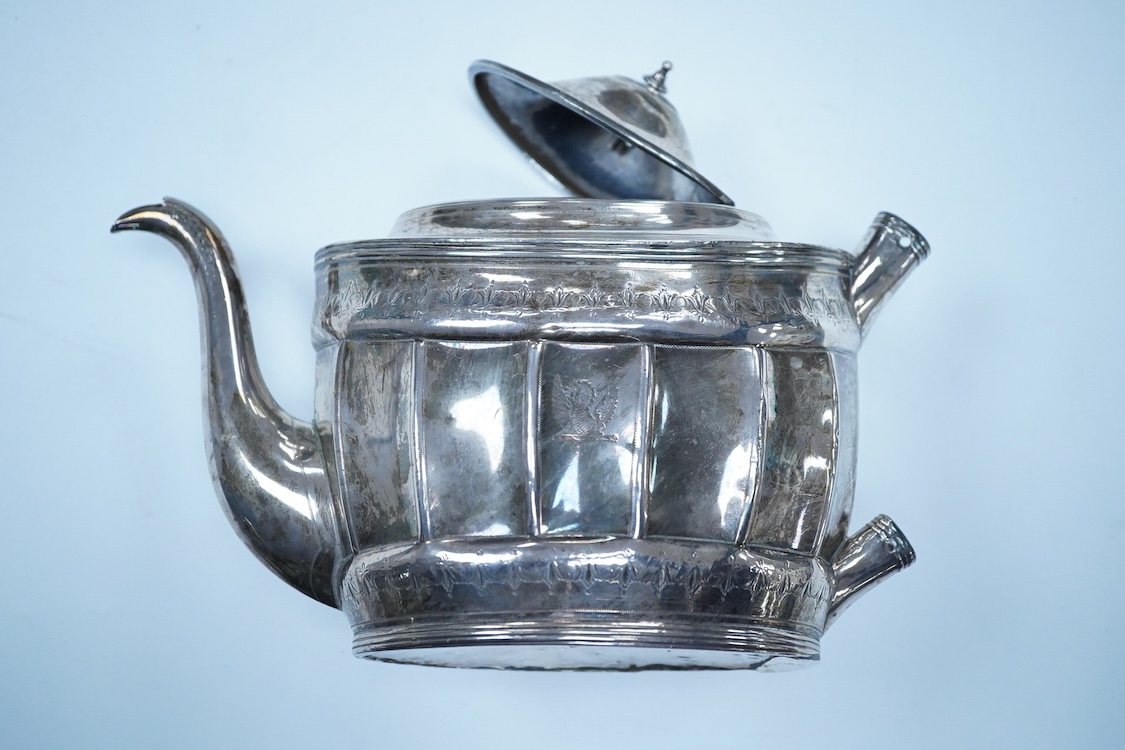 A George III silver oval teapot, by Peter, Ann & William Bateman, London 1804, (a.f.). engraved with floral bands, 14.4oz.